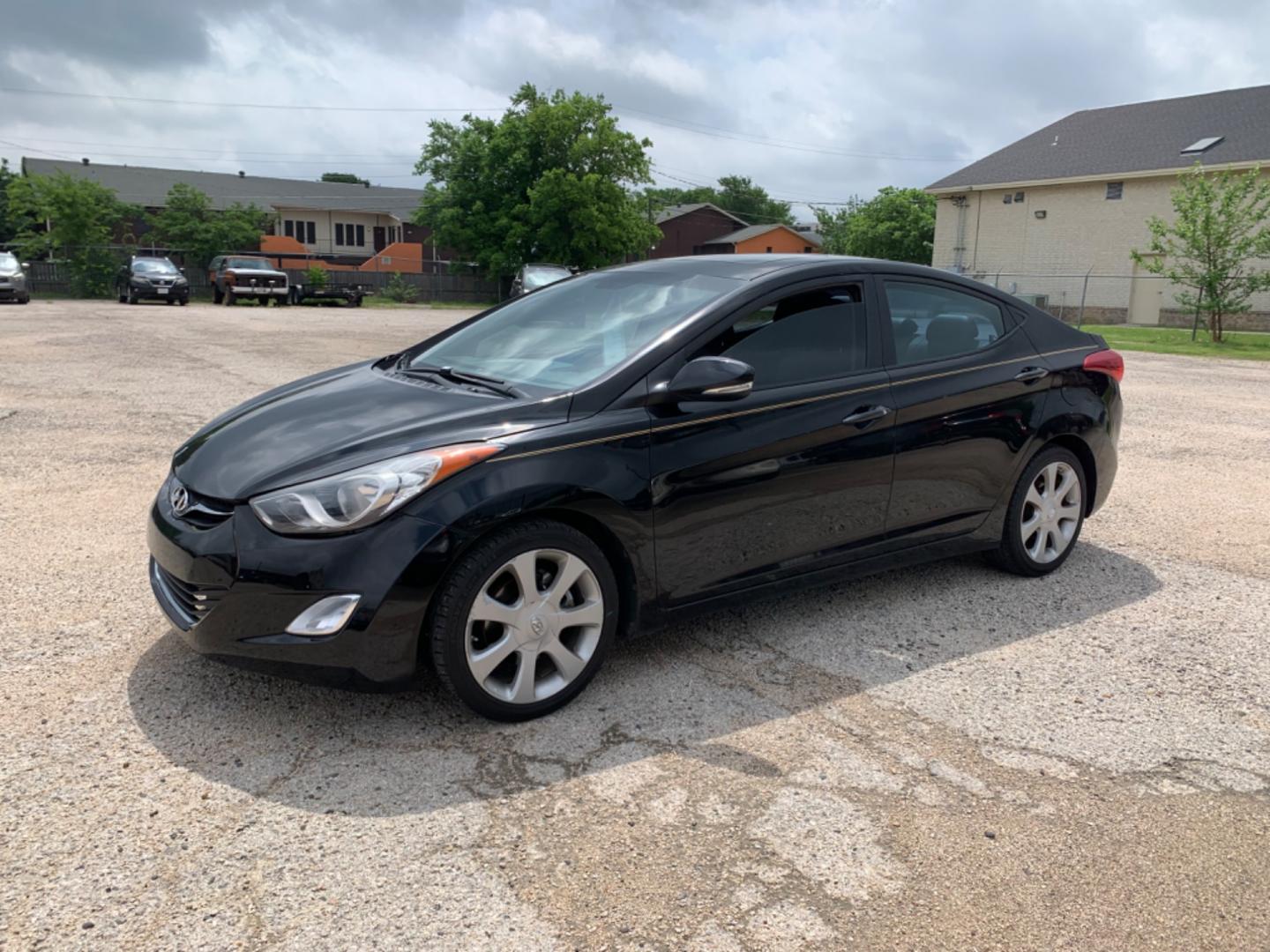 2012 Black Hyundai Elantra GLS A/T (KMHDH4AE3CU) with an 1.8L L4 DOHC 16V engine, Automatic transmission, located at 1830 North Belt Line Road, Irving, TX, 75061, (469) 524-0199, 32.834373, -96.993584 - Photo#2